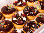 Load image into Gallery viewer, 21 Chocolate Glazed Donuts
