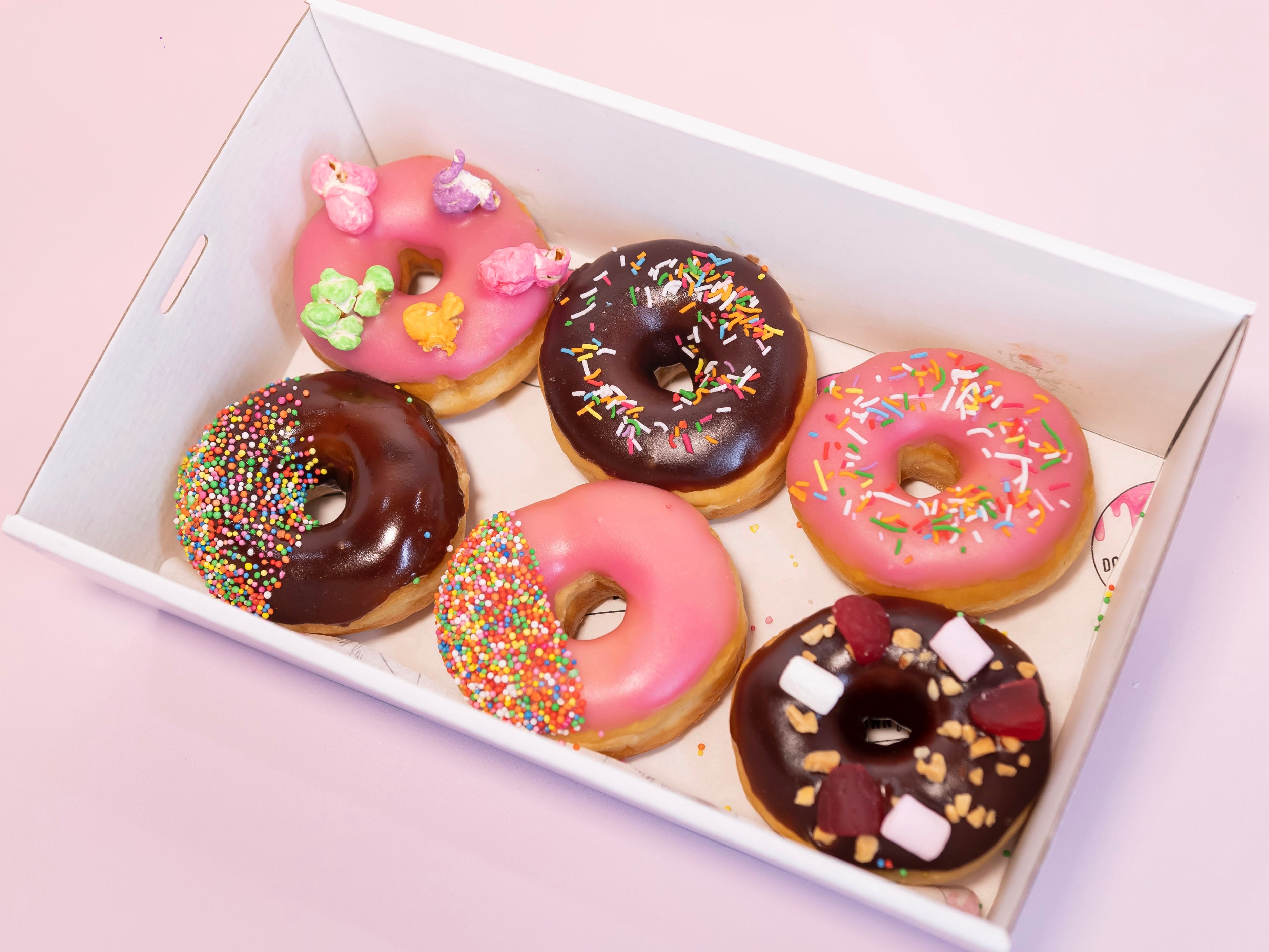 6 Chocolate / Strawberry Glazed Donuts